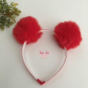 Tiara pompons de pelúcia vermelho