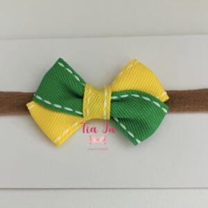 Faixa com laço cruzado verde e amarelo pespontado