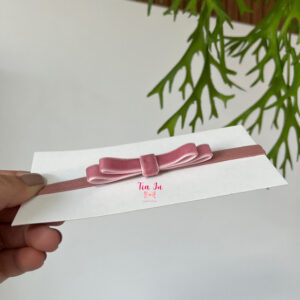Faixa com laço Chanel rosa antigo