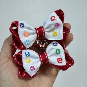 Par de laço boutique vermelho e branco com letras