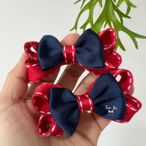 Par de laço boutique vermelho e azul marinho